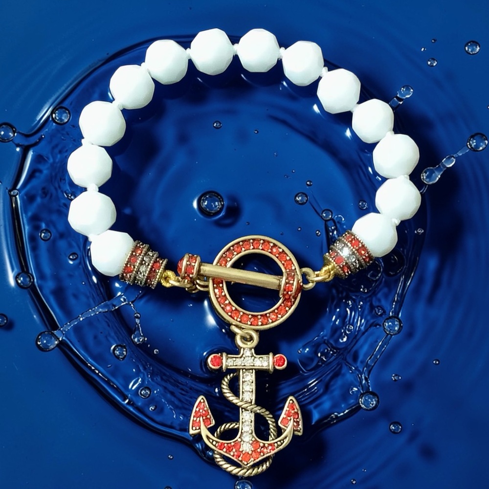 Heidi Daus White Beaded Bracelet with Gold & Red Crystal Anchor Charm. NWOT